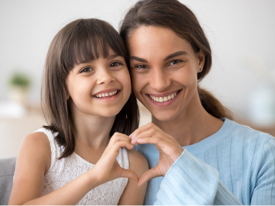 Smiling Mom & Daughter